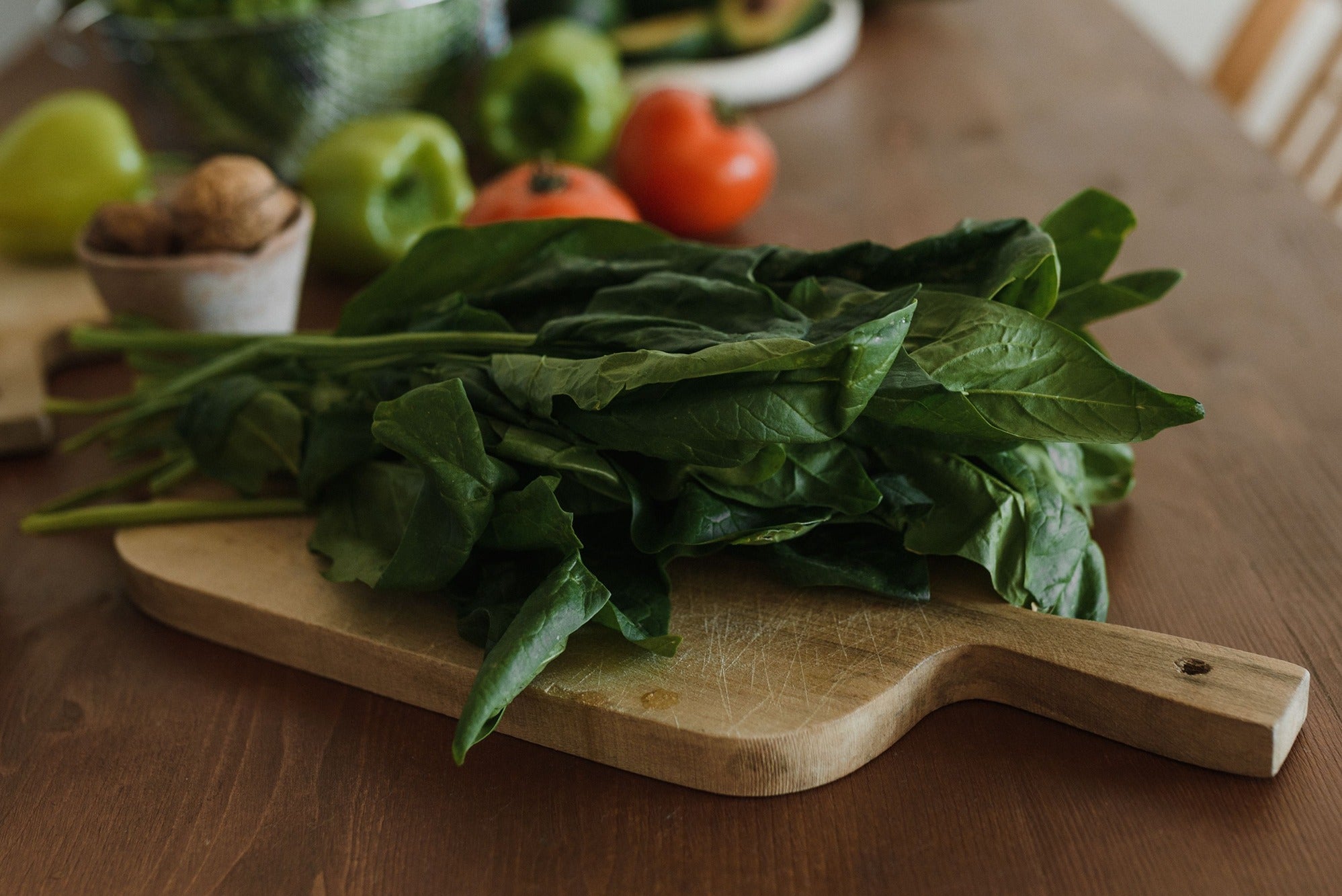 Magnesium-rich foods including leafy greens, nuts, and seeds.